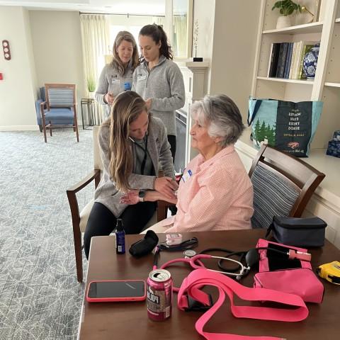 Students perform health screenings for older adults at Bessey Crossing